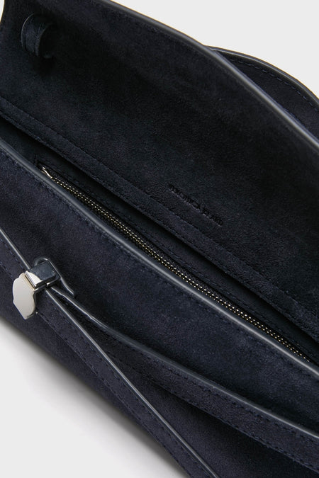 Navy Suede Veronica Beard Dash Clutch featuring an effortlessly classic design with a zippered inner pocket, soft suede lining, and high-end silver-tone hardware.