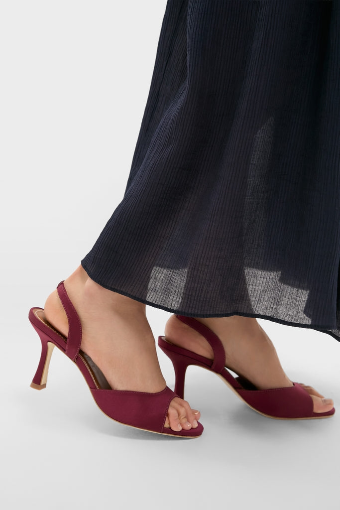 Mulberry Brigitte Heel: A classic, high-end burgundy satin slingback sandal with an effortless open-toe design, perfect for adding fun sophistication to any outfit.
