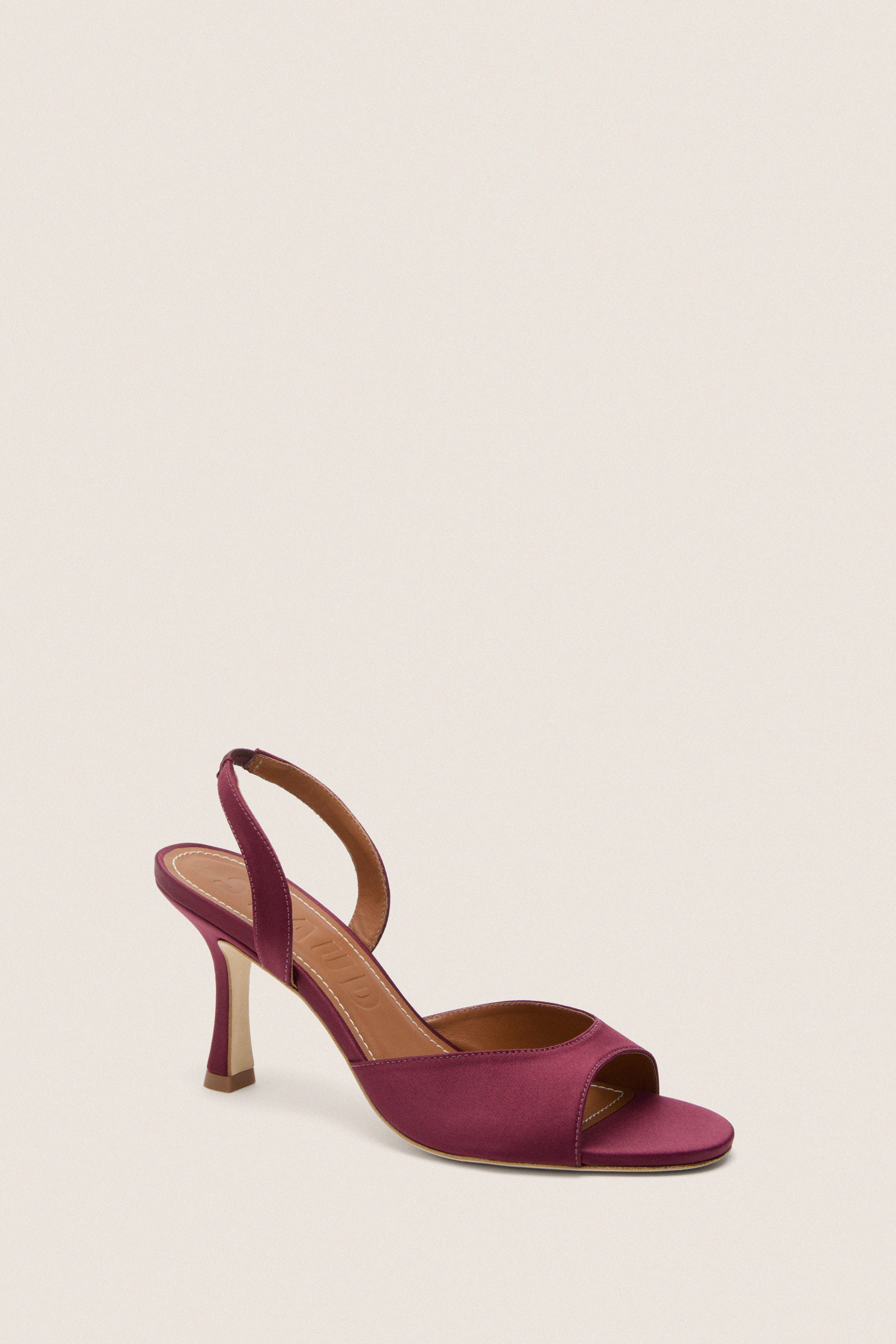 Mulberry Brigitte Heel: Classic open-toe, magenta slingback sandal with a sleek stiletto heel, offering an effortless, high-end style for fun, versatile dressing.