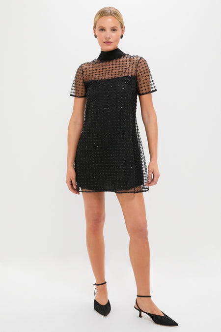 Stardust Onyx Ilana Dress: A classic, high-end mini with a shimmering, embellished tulle shell and self-tie bow, offering an effortless, fun statement look.