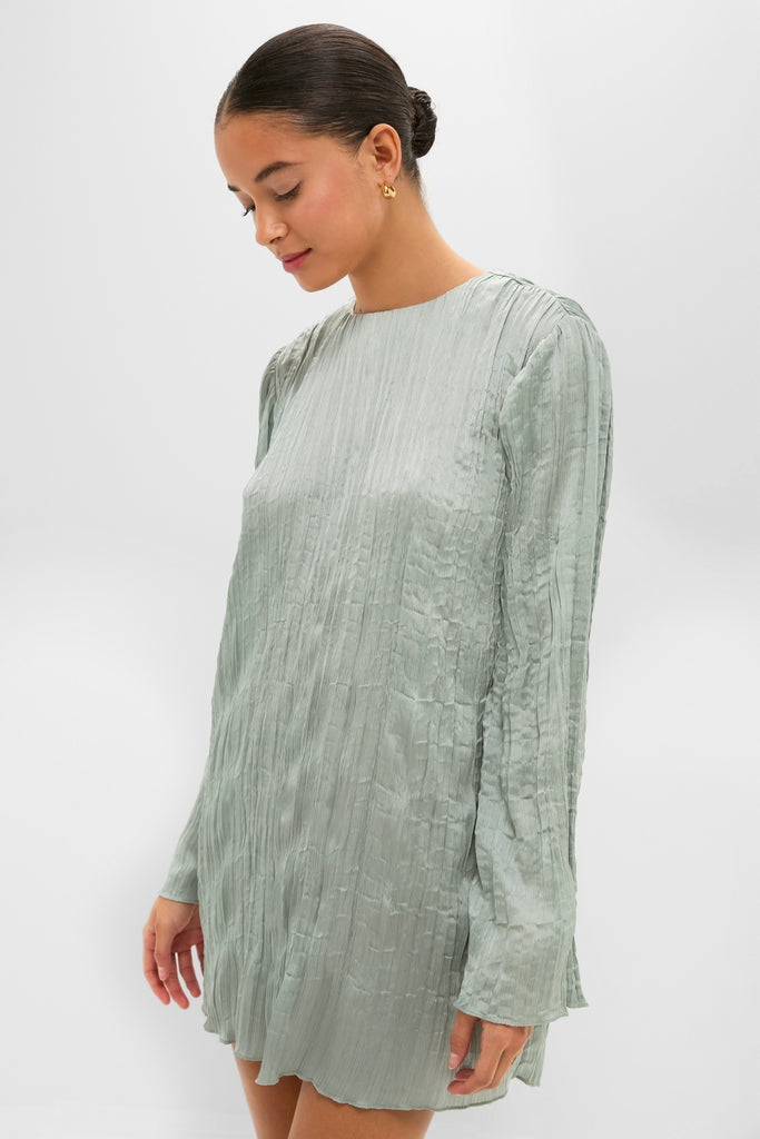 Silver Sage Kona Dress exudes classic elegance with its effortless pleated texture, relaxed fit, and high-end appeal, perfect for fun outings or chic occasions.