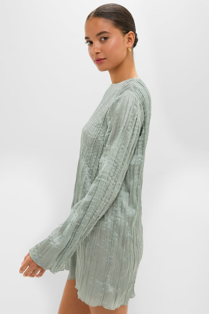 Effortlessly classic Silver Sage Kona Dress in crinkle texture, featuring long sleeves and a straight silhouette. Perfect for high-end, fun, and confident style.
