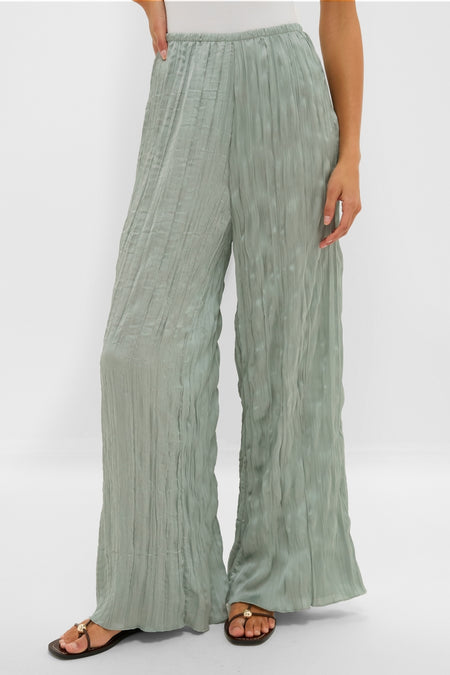 Silver Sage Nami Pant: classic, effortless palazzo with crinkled texture and elastic waistband, paired with black thong sandals, exuding high-end, fun style.