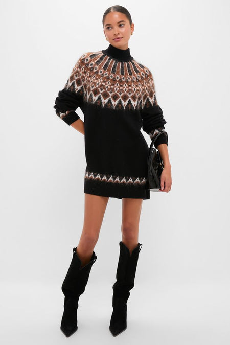Zermatt Liza Sweater Dress: A classic, high-end black knit sweater-dress with fair-isle pattern, styled effortlessly with black suede boots and a shiny handbag for a fun, confident look.