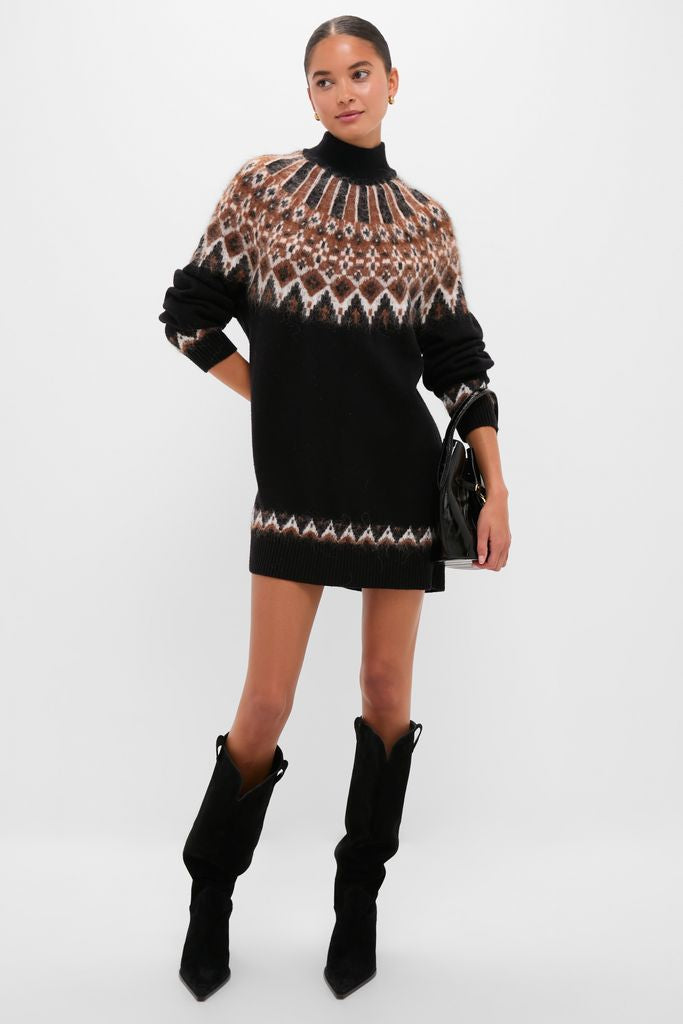 Zermatt Liza Sweater Dress: A classic, high-end black knit sweater-dress with fair-isle pattern, styled effortlessly with black suede boots and a shiny handbag for a fun, confident look.