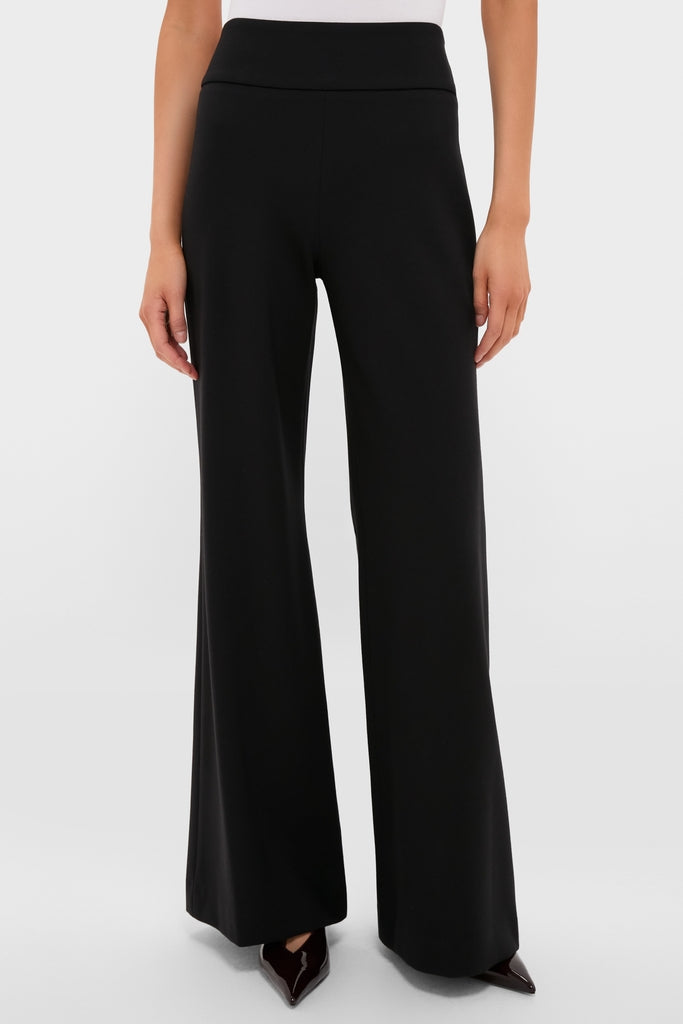The Black Kalinda Pant exemplifies classic, effortless style with its high-waisted, wide-leg design and polished pressed crease, perfect for a fun, high-end look.