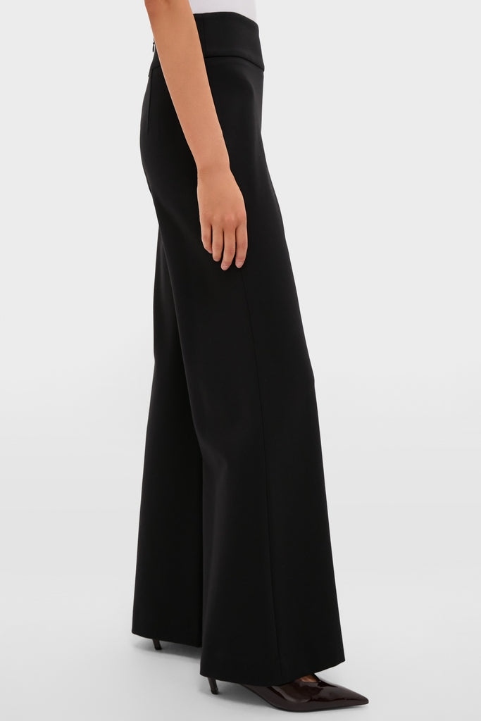 Classic and high-end Black Kalinda Pant with effortless wide-leg design and fun, sleek high waistband. Perfect for versatile styling, featuring a pressed front crease.