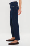 Indigo Rinse Leah Mid Rise Straight Leg jeans offer a classic, effortless look, paired with brown suede ballet flats, embodying Tuckernuck's fun, high-end style.
