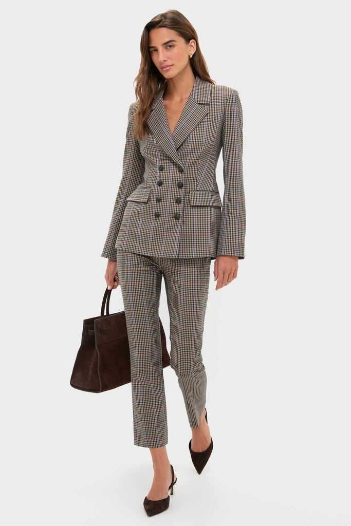 Model in Russet Multi Arte Pant, a classic high-rise, slim-fit style with a slightly flared hem and welt pockets, embodying effortless, high-end fashion.