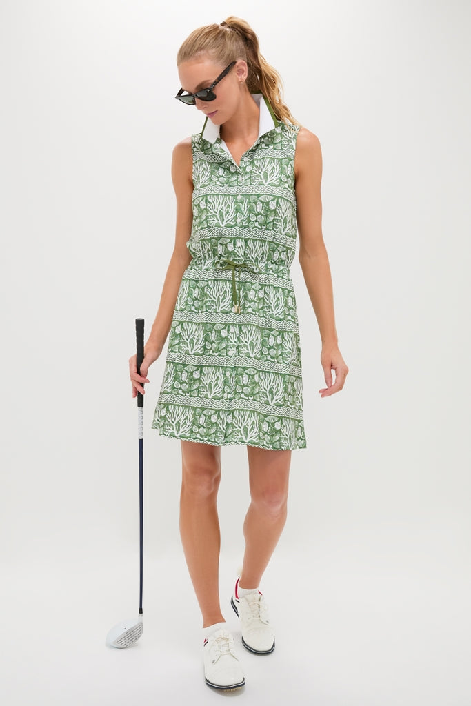 Calypso Reef Sleeveless Performance Jersey Alcott Golf Dress modeled with effortless style, showcasing its classic, high-end design. Perfect for fun, sporty outings, paired with white golf shoes.