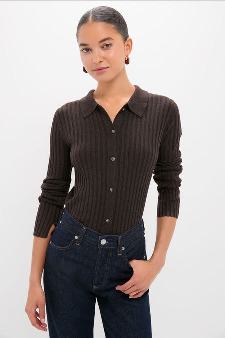 Woman models the classic Chocolate Fine Rib Knit Button Down Myers Polo, effortlessly styled with high-waisted jeans and hoop earrings, capturing a high-end, fun look.