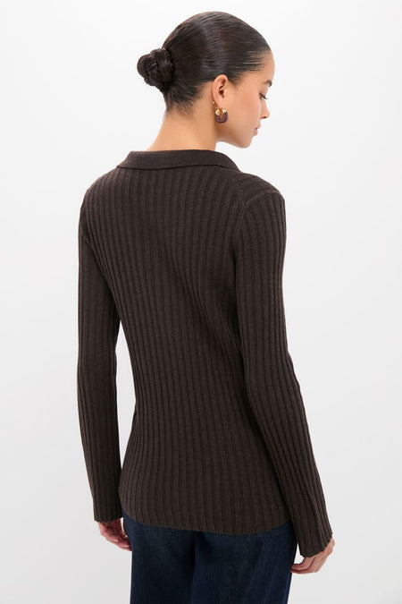 Back view of a person wearing the Chocolate Fine Rib Knit Button Down Myers Polo, showcasing a classic, effortless style with a small collar and gold hoop earrings.