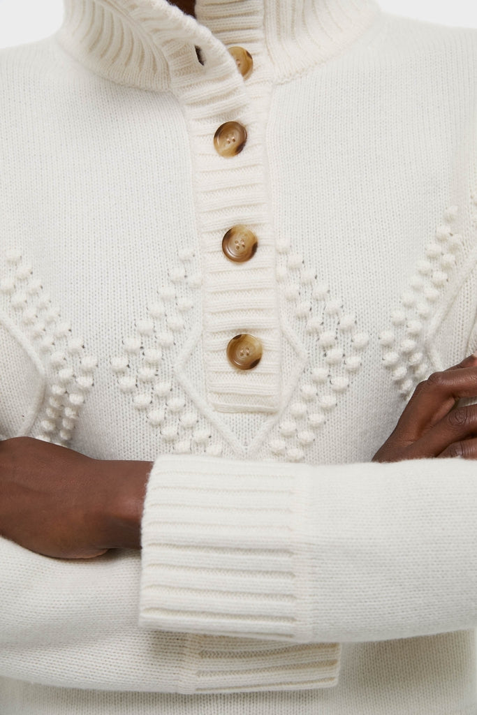 Ivory Henry Button-Up Sweater: classic, high-end knit with textured bobble-and-diamond pattern, ribbed accents, and button-up collar. Effortlessly chic for a fun, stylish winter look.