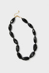 Onyx Wrenlee Necklace: A classic, high-end piece with faceted black beads and adjustable gold-tone clasp, offering an effortless, fun style for any occasion.