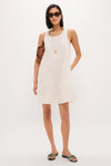 Ivory Lace Organza MaryLiza Swing Dress, a classic, effortless A-line mini dress in lace organza, styled with fun gold jewelry and sandals for a high-end look.