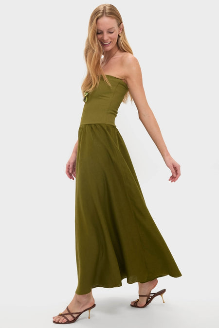 Effortlessly chic, the Green Empowerment Movement Ankle Skirt worn as a strapless dress, showcases a classic, high-end style with versatile, fun elegance.