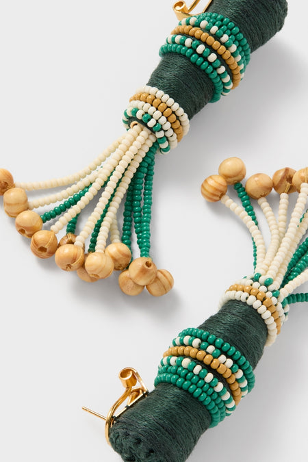 Light Green and Ecru Mosaic Dreams Earrings feature classic, hand-embroidered tassels with intricate beadwork, offering an effortless, fun, and high-end statement piece for any ensemble.