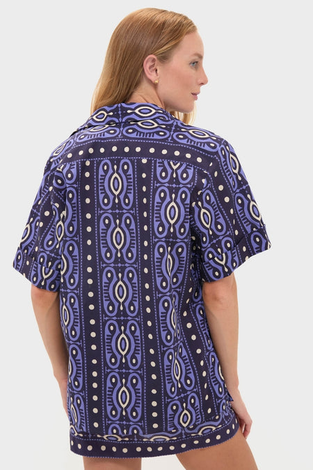 Person in profile wearing the Navy and Ecru Salty Promises Shirt, a classic, effortless piece with bold geometric print, embodying high-end, fun fashion.