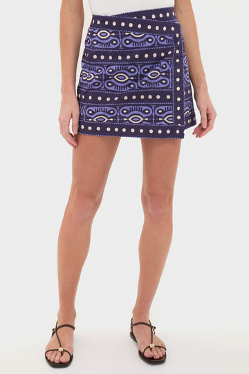 Navy and Ecru Hunting Roots Wrap Skirt in bold geometric print paired with black sandals, offering a classic, effortless look for fun, high-end getaways.