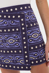 Effortlessly stylish, the Navy and Ecru Hunting Roots Wrap Skirt in rich patterns features a flattering mini length with a classic, fun wrap design.