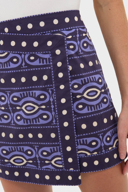 Effortlessly stylish, the Navy and Ecru Hunting Roots Wrap Skirt in rich patterns features a flattering mini length with a classic, fun wrap design.