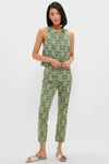 Woman modeling Cowrie Block Print Ashford Pants, a classic, effortless two-piece outfit with a botanical print, exuding fun and high-end style against a light-gray background.