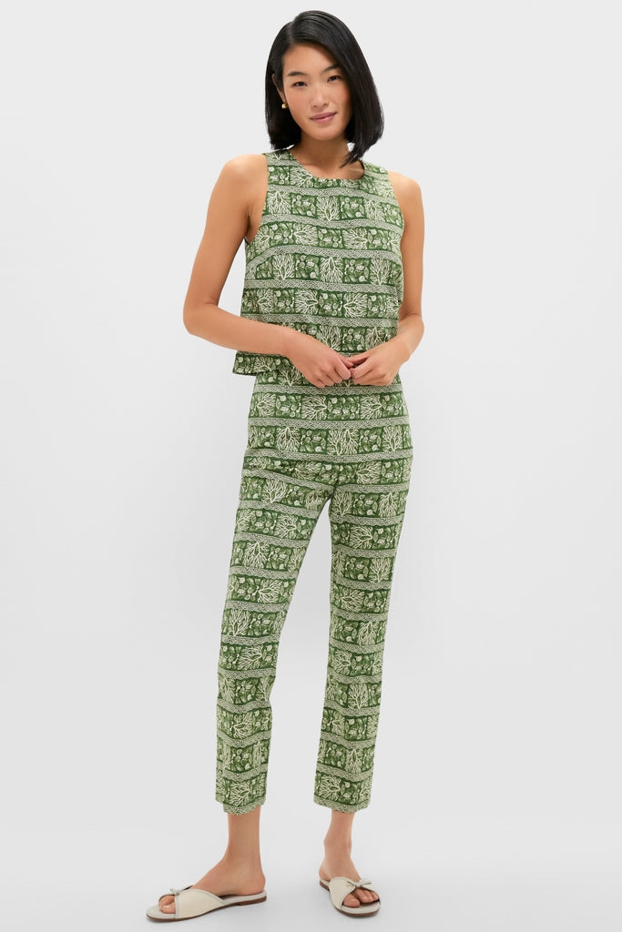 Woman modeling Cowrie Block Print Ashford Pants, a classic, effortless two-piece outfit with a botanical print, exuding fun and high-end style against a light-gray background.