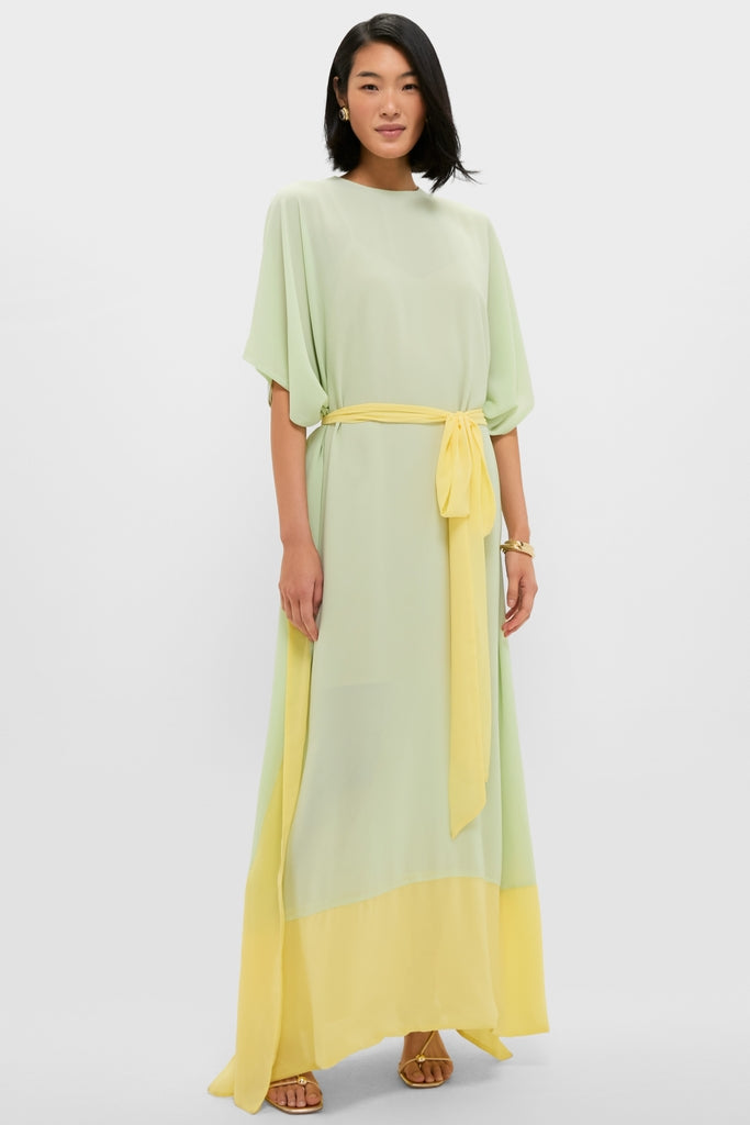 Model in Mint Chiffon Caftan Gown, featuring a flowy silhouette, citron hem, and self-tie belt, exuding classic, effortless elegance with high-end accessories.