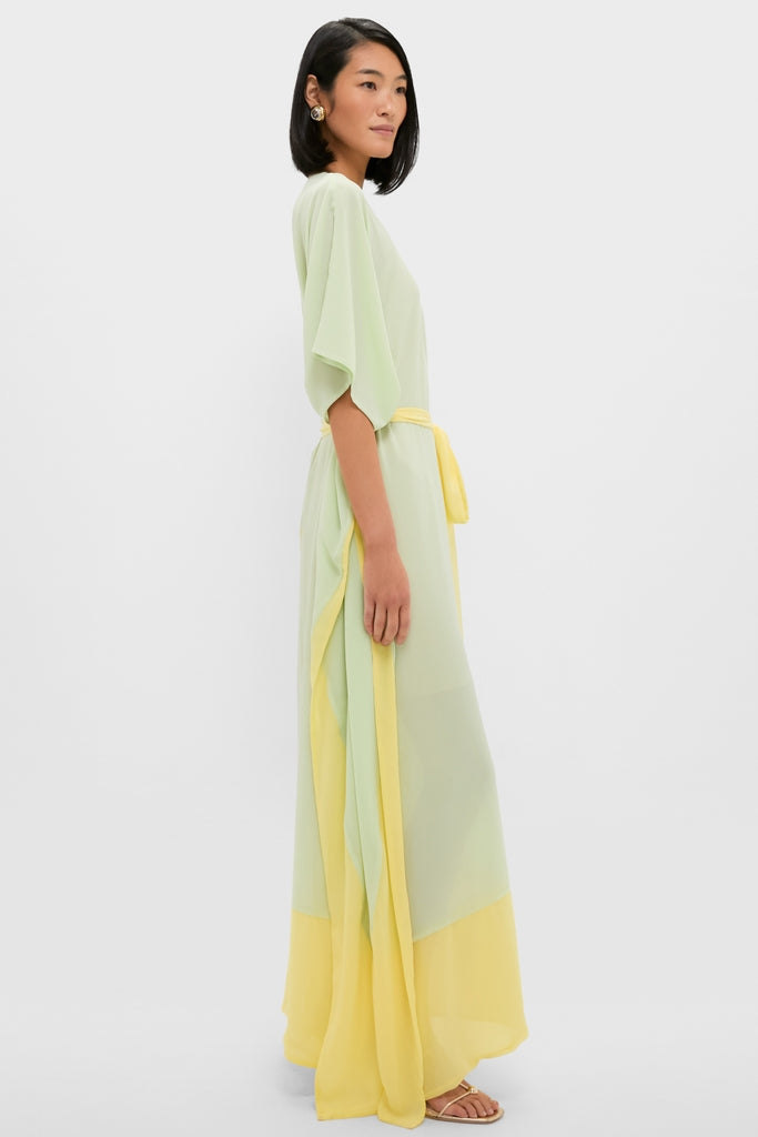 Mint Chiffon Caftan Gown, classic and high-end, with a flowing silhouette, citron accents, and gold sandals, exudes effortless elegance and fun. Perfect for evening occasions.