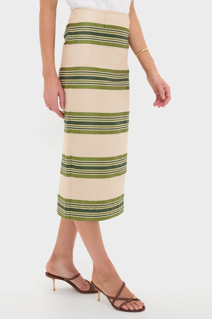 Satin Stripe Ellington Skirt: A high-waisted, midi-length classic pencil skirt with olive-green stripes, paired with strappy sandals for an effortless, high-end look.