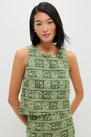 Woman wearing the Cowrie Block Print Keating Top, showcasing a classic, sleeveless, boxy-cut design with effortless botanical motifs, embodying a fun and high-end style.
