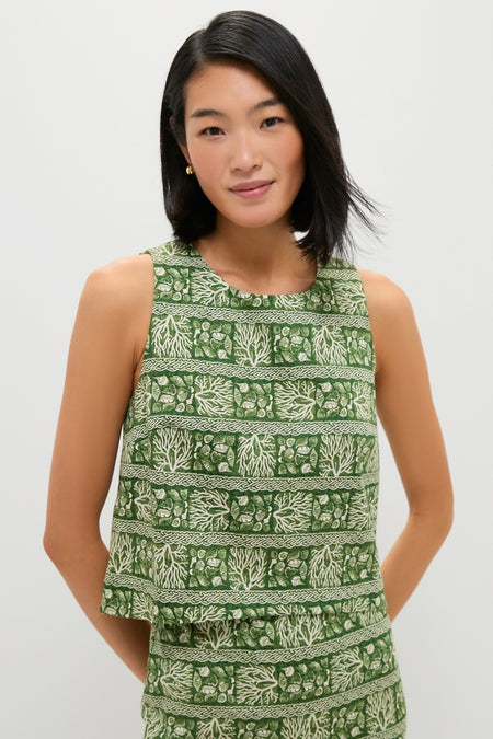 Woman wearing the Cowrie Block Print Keating Top, showcasing a classic, sleeveless, boxy-cut design with effortless botanical motifs, embodying a fun and high-end style.