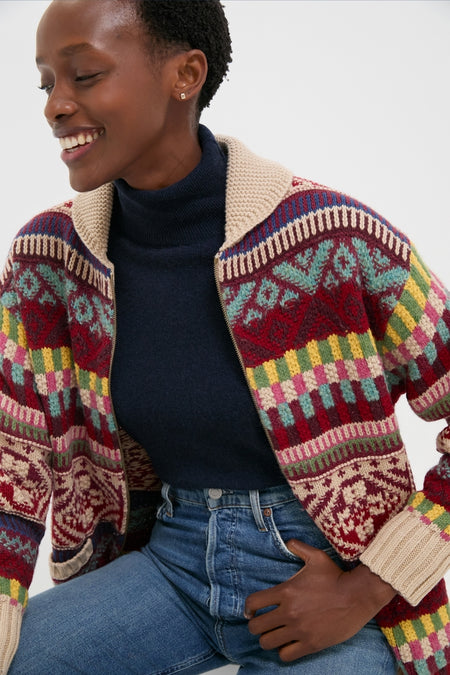 Person wearing Brick Multi Cotton Wool Blend Sweater by Polo Ralph Lauren, styled with a navy turtleneck and medium-wash jeans, embodying classic, effortless, and high-end fashion.