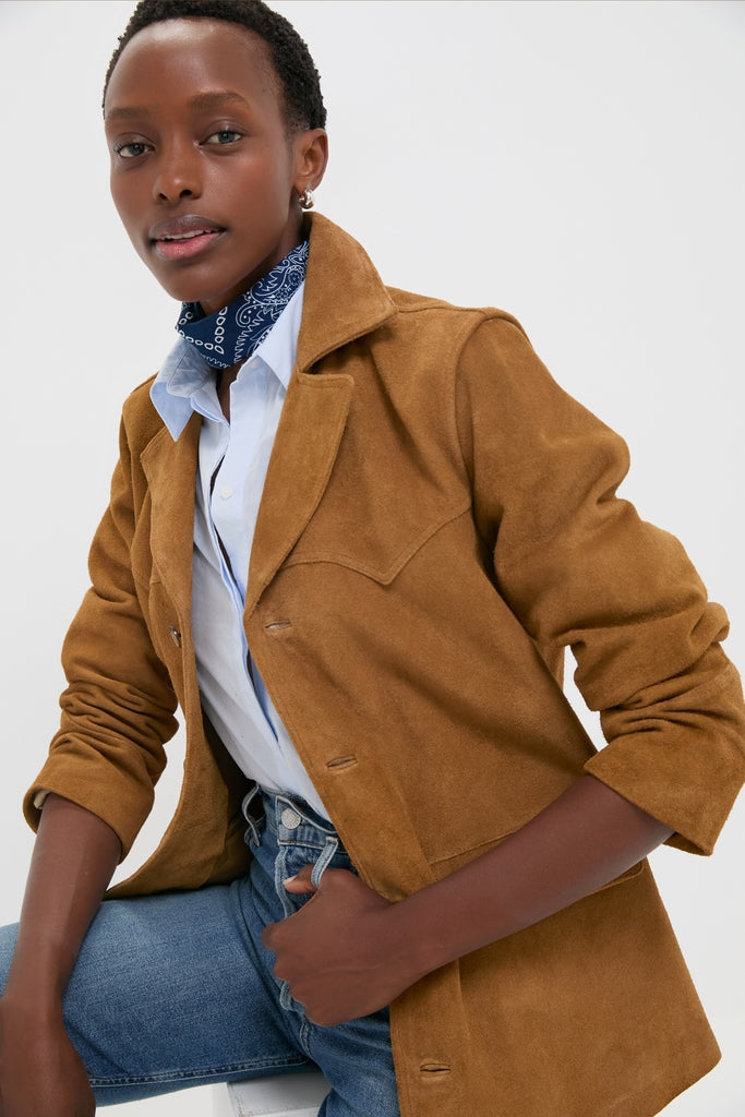 Model effortlessly wearing the Maple Cow Roughout Suede Jacket, embodying classic style with a high-end, fun twist in a relaxed, modern look.