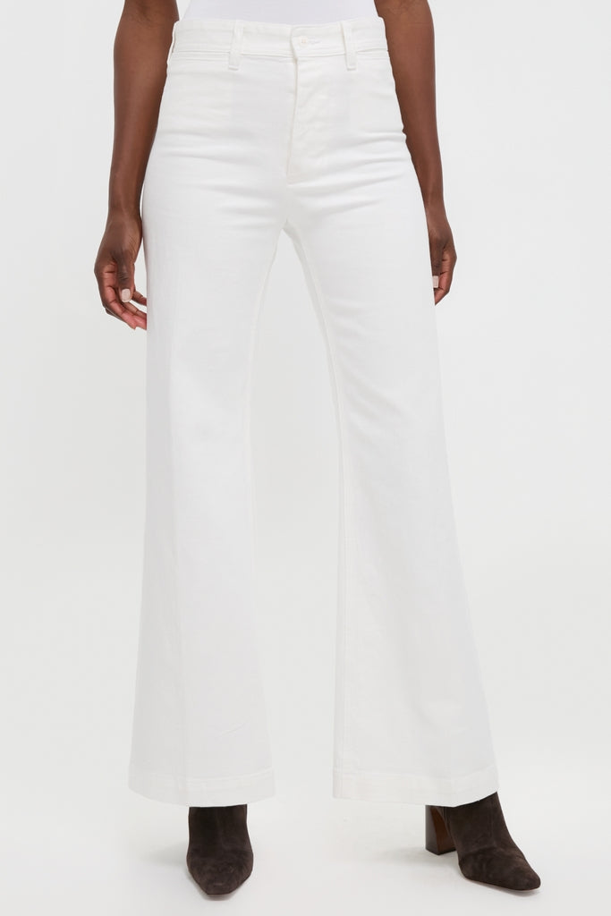 Nevis Cotton Twill Woven Standard Flare Pants modeled with dark ankle boots, showcasing a classic, effortless high-rise, wide-leg fit for a fun, high-end style.