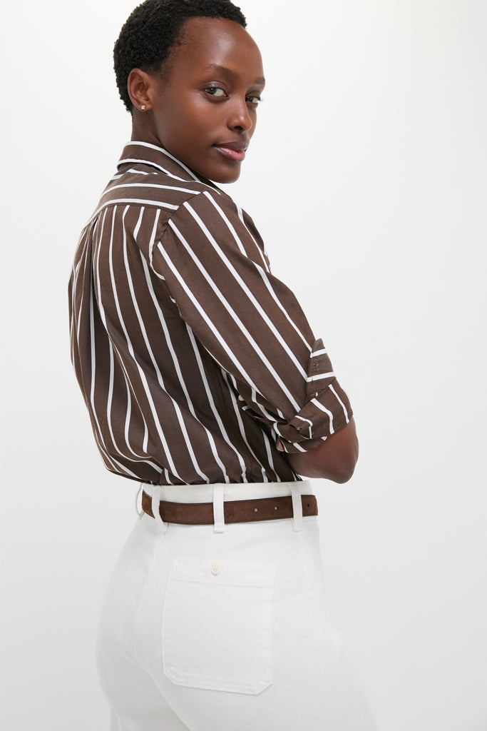 Person in profile wears Nevis Cotton Twill Woven Standard Flare Pants, showcasing a high-rise, wide-leg silhouette for a classic, effortlessly cool look.