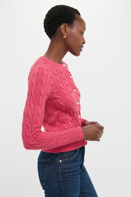 Classic Nantucket Red Cardigan with cable-knit detailing and ribbed trim, offering an effortless, high-end look. Perfect with jeans for a fun, confident style.