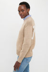 Tan Heather Cotton Long Sleeve Crewneck on dark-skinned person, styled effortlessly with a collared shirt and jeans, showcasing classic, high-end, and fun Tuckernuck appeal.