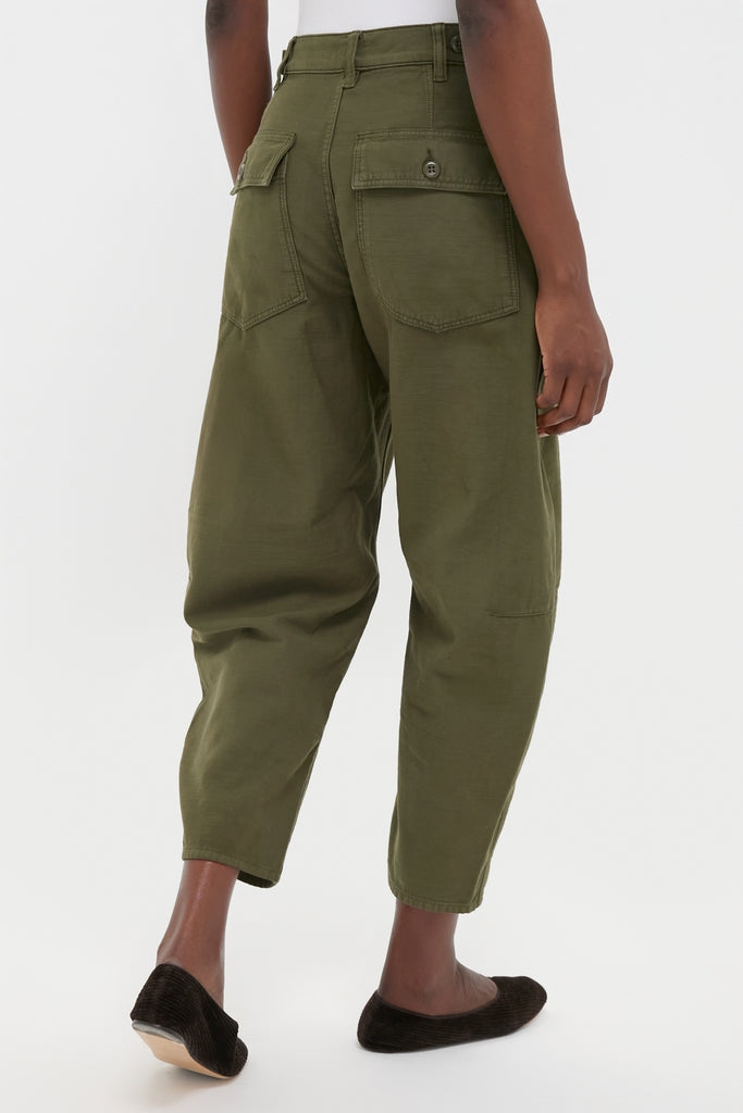 Back view of the Dark Olive Reverse Sateen Woven Ankle Tapered Pants showcasing a classic, effortless design with high-end utility details like button-flap pockets and adjustable waist tabs.