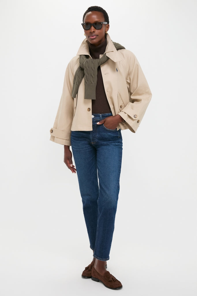Model wearing a classic, effortless look featuring a Beige Cotton Double Cloth Woven Jacket by Polo Ralph Lauren, styled with fun, high-end accessories and timeless wardrobe staples.