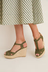 Clover Suede Jules Espadrilles, classic and effortless, feature an adjustable ankle strap, peep toe, and high-end jute wedge, perfect for fun, stylish outings.