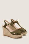 Clover Suede Jules Espadrilles: Classic olive-green espadrille wedges with an effortless T-strap design, jute heel, and adjustable ankle strap for a high-end, fun summer look.