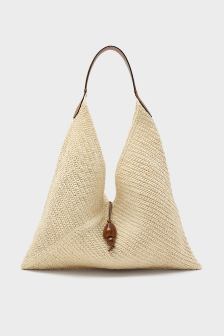 Natural Fique Large Origami Shoulder Bag—a classic, effortless beach-style tote with a triangular woven body, slim handle, and wooden bead detail for a high-end, fun look.