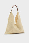 Natural Fique Large Origami Shoulder Bag: A classic, high-end tote with an effortless triangular silhouette, crafted from pale beige woven material and a contrasting brown leather strap.