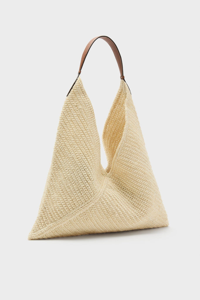 Natural Fique Large Origami Shoulder Bag: A classic, high-end tote with an effortless triangular silhouette, crafted from pale beige woven material and a contrasting brown leather strap.