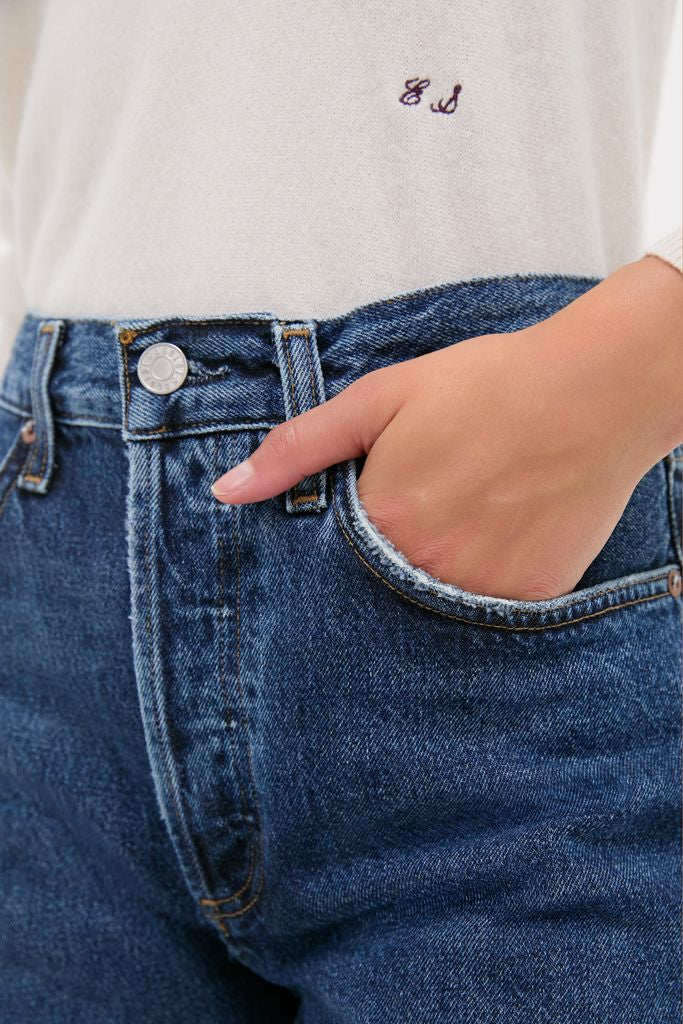 Classic and effortless, the Shortwave Arc Jean is showcased with a hand in the pocket, paired effortlessly with a light top featuring a subtle purple monogram.