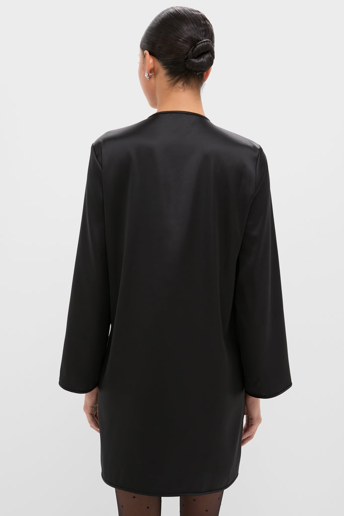 Back view of the Black Satin Tatiana Dress, highlighting its classic, effortless style with long sleeves and chic detailing, perfect for high-end, fun occasions.