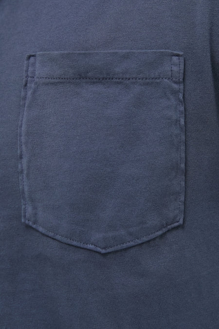 Classic Faded Navy Garment Dyed Long Sleeve Polo, showcasing effortless style with a sewn-on chest pocket and visible stitching detail, crafted from high-end Pima cotton for fun, versatile wear.
