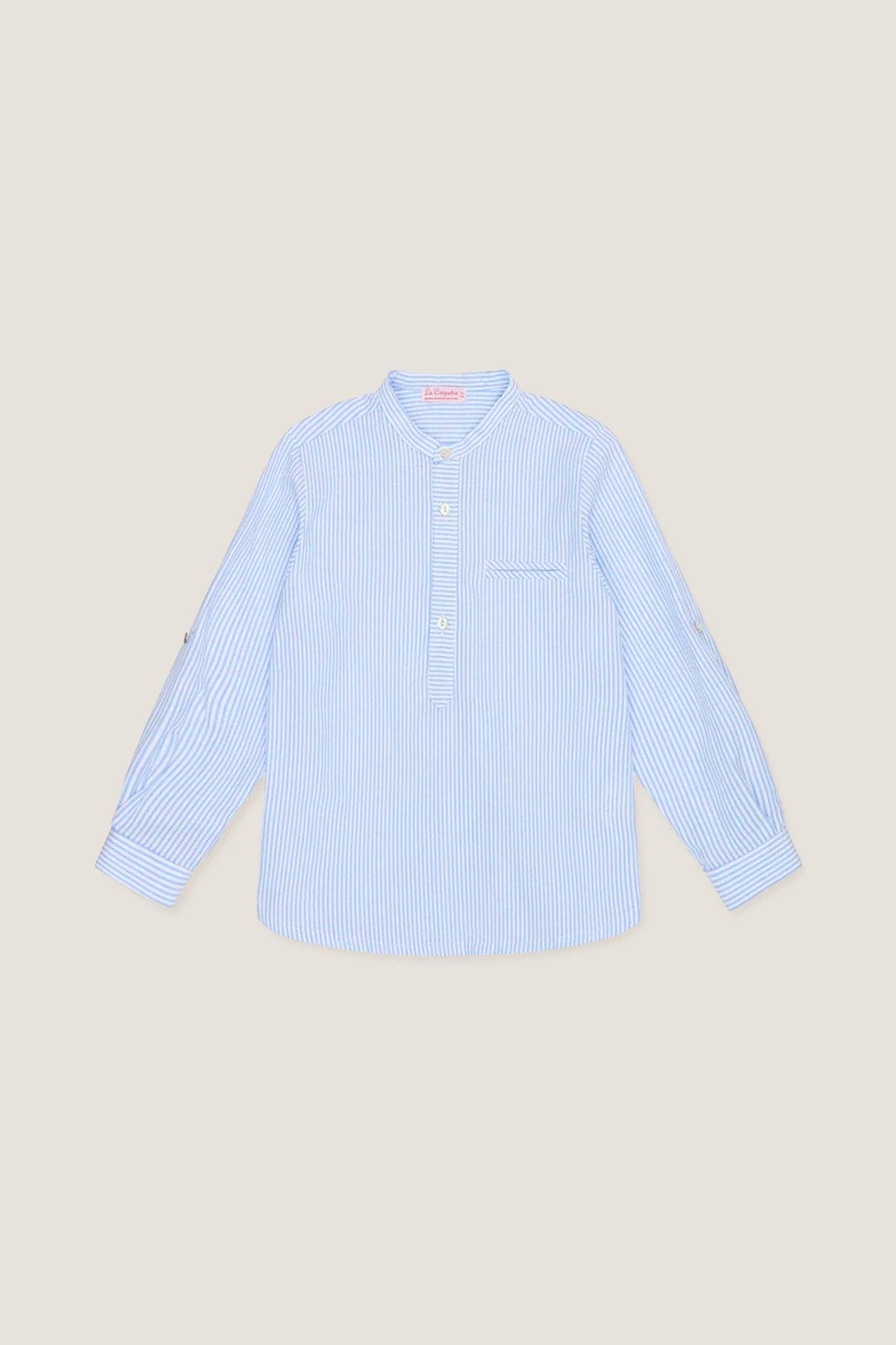 Blue Stripe Mateo Long Sleeve Shirt with a mandarin collar, chest pocket, and button-adjustable sleeves. A classic, effortless style for kids by La Coqueta.