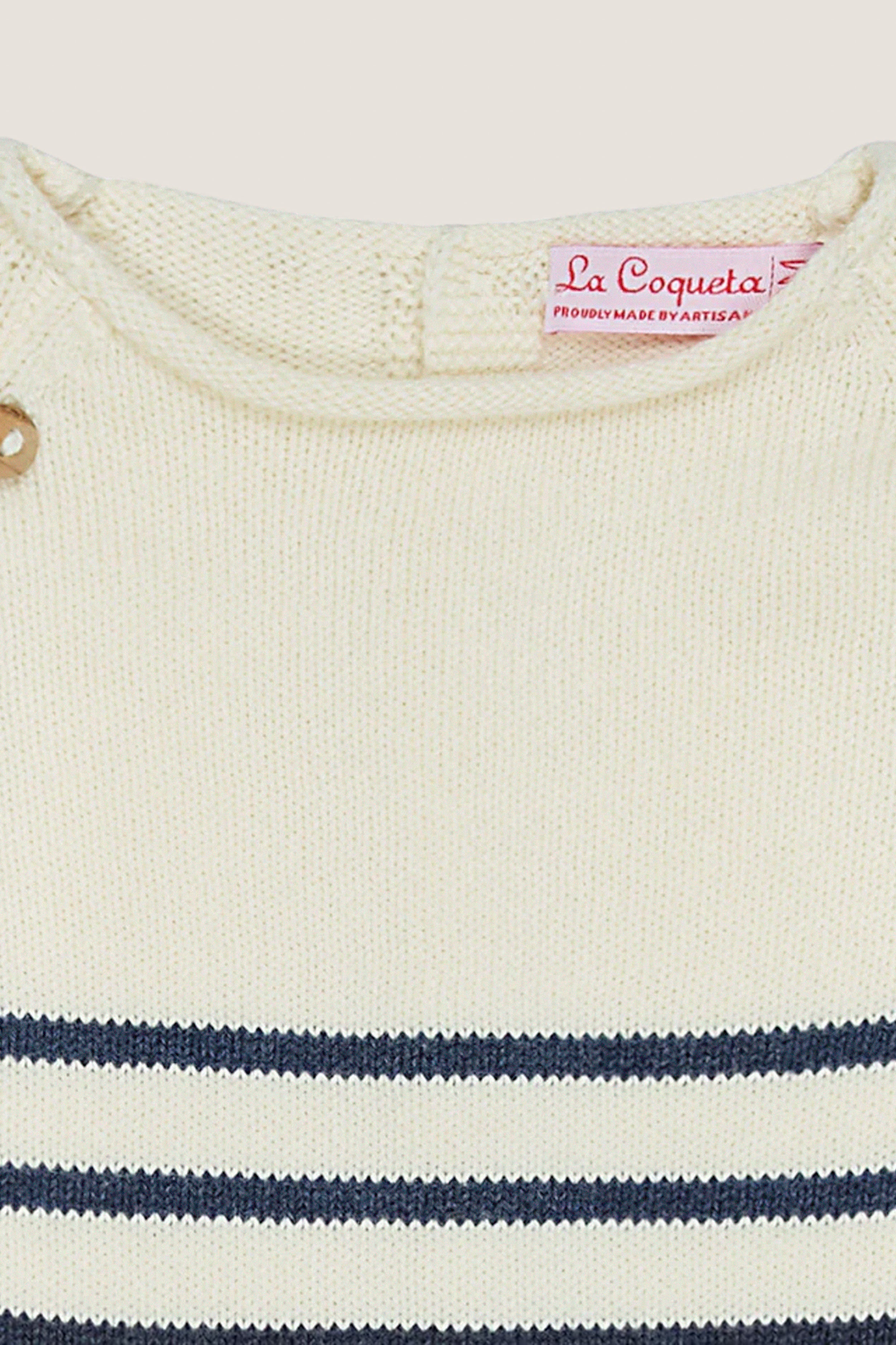 Navy Stripe Monda Cotton Baby Knitted Set with classic round neckline, effortless shoulder button detail, and fun Breton stripes, embodying high-end style and comfort.